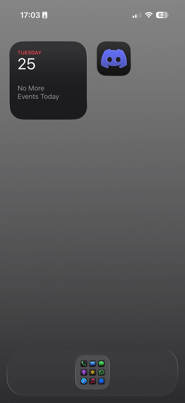 Minimalist iPhone home screen with one widget stack, one app icon and one folder of icons in the dock. Dark background to make etc dock fade in to it.